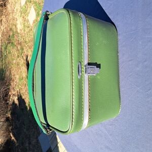 Vibrant Green Cosmetic Bag with White Trim and Silver Zipper
